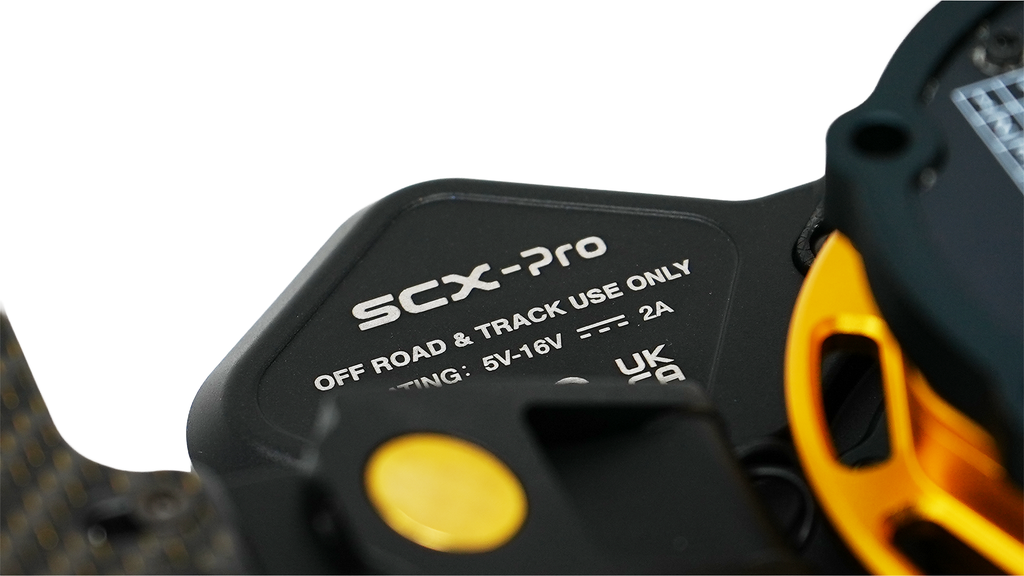 Zestek SCX Pro hub RPM shift lights and status indicators on the carbon fiber panel